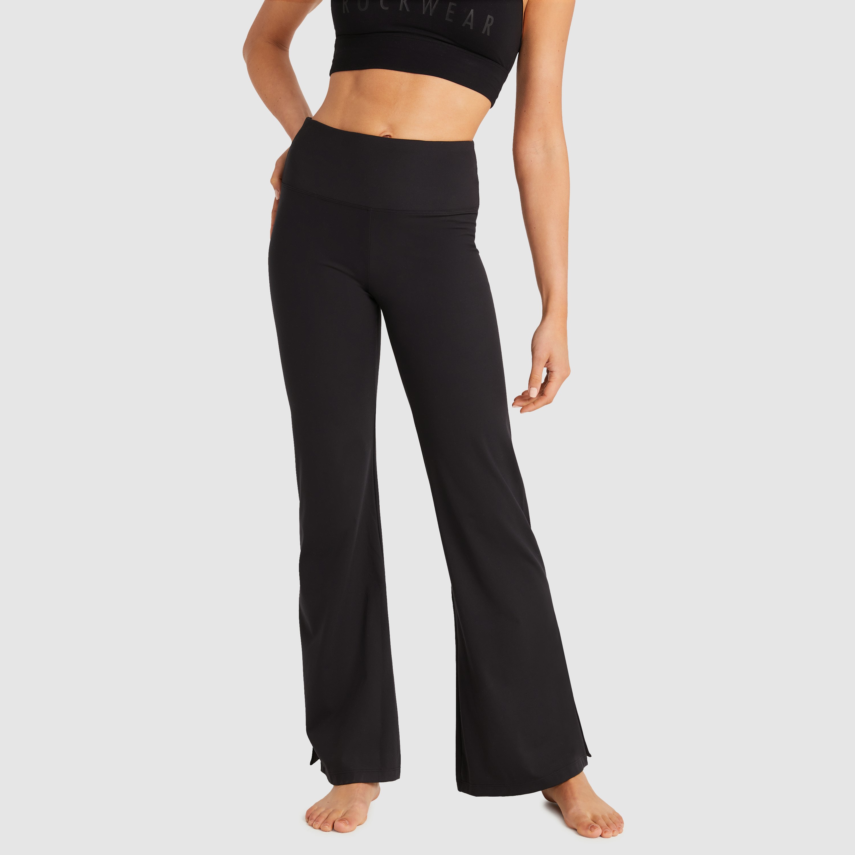 Black gym flare pants for women, ankle length sports pants.